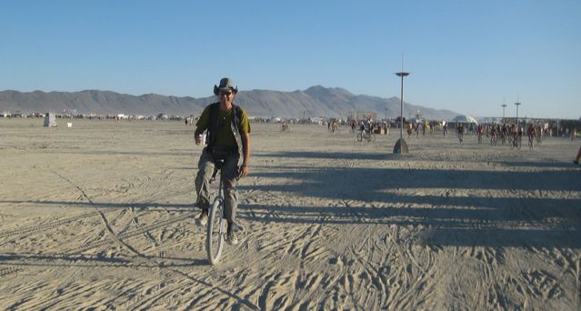 img_1246.jpg: Unicycling on the Esplande with beer in hand (photo by Lee)